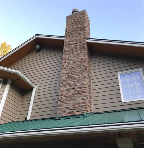 metal chimney on outside of house|faux brick for exterior chimney.